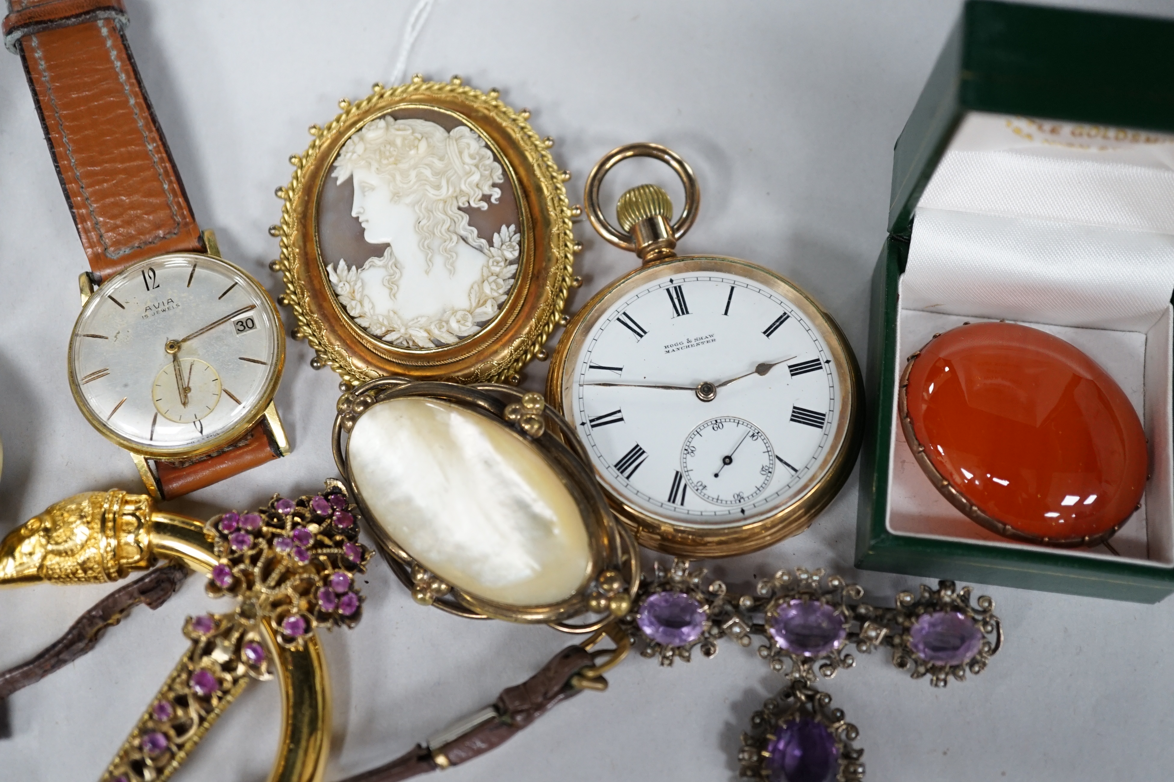 A yellow metal mounted oval cameo shell brooch, carved with the bust of a lady to dexter, with cannetille and rope twist border and other items including costume jewellery, a gold plated pocket watch, two gentleman's wri